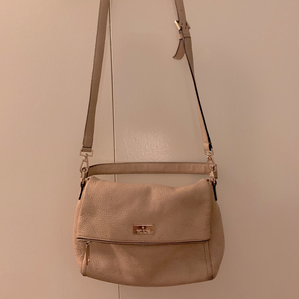 Kate spade cream colored purse. Medium size